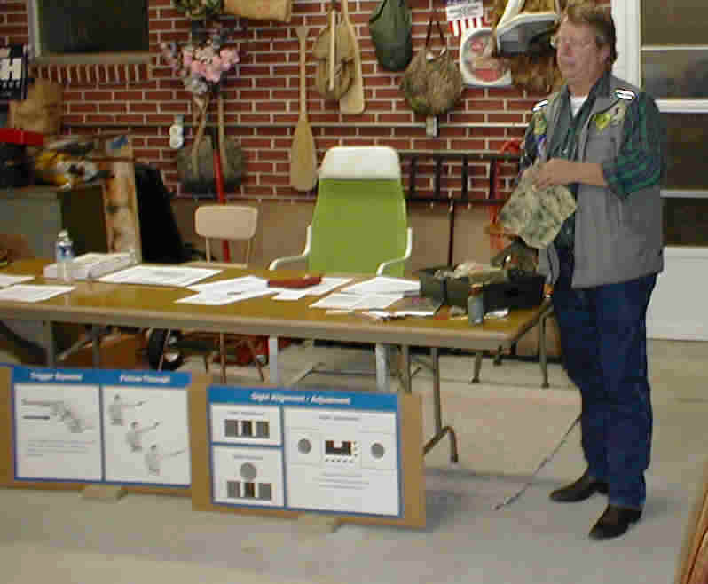 An Instructor demonstrates proper firearm care.
